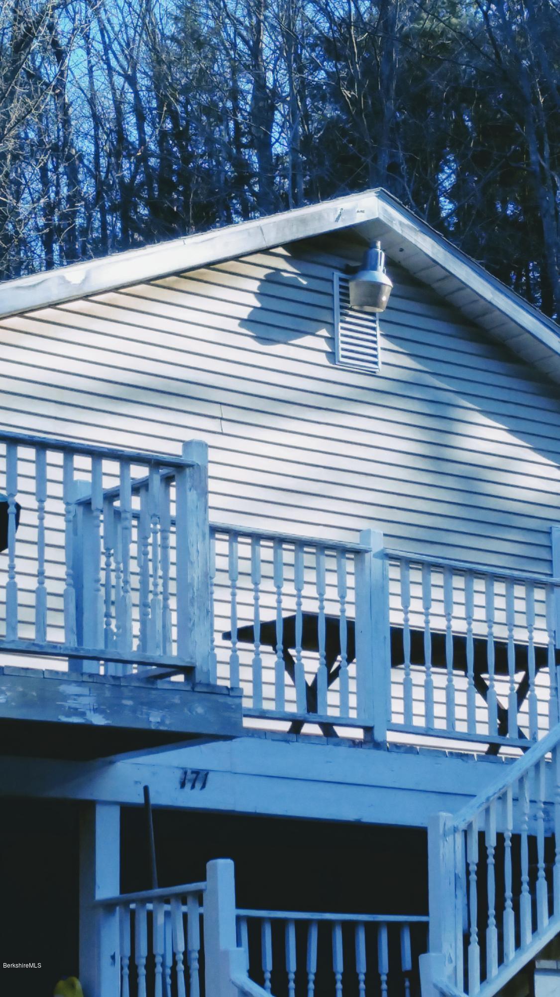 171 Worthington Road Huntington, MA 01050 - Photo 2 of 2 a view of a house with a balcony and wooden floor