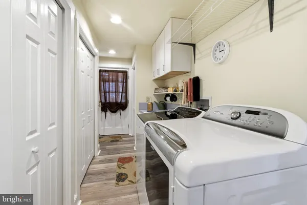 a room with a bed and a view of bathroom