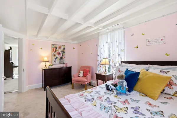 a bed room with a bed and a couch