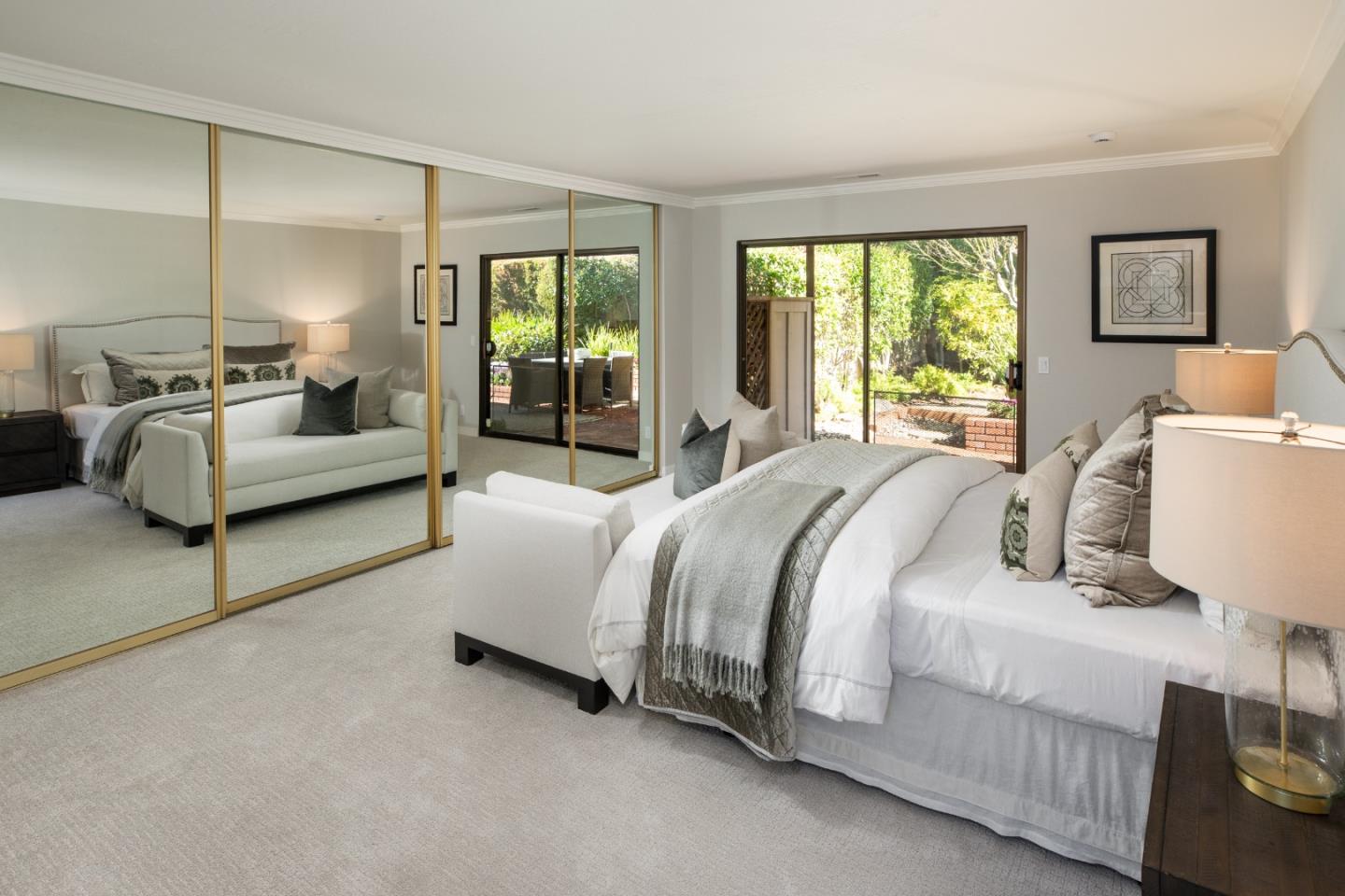 71 Bay Tree Lane Los Altos, CA 94022 - Photo 12 of 32 a spacious bedroom with a bed and large window