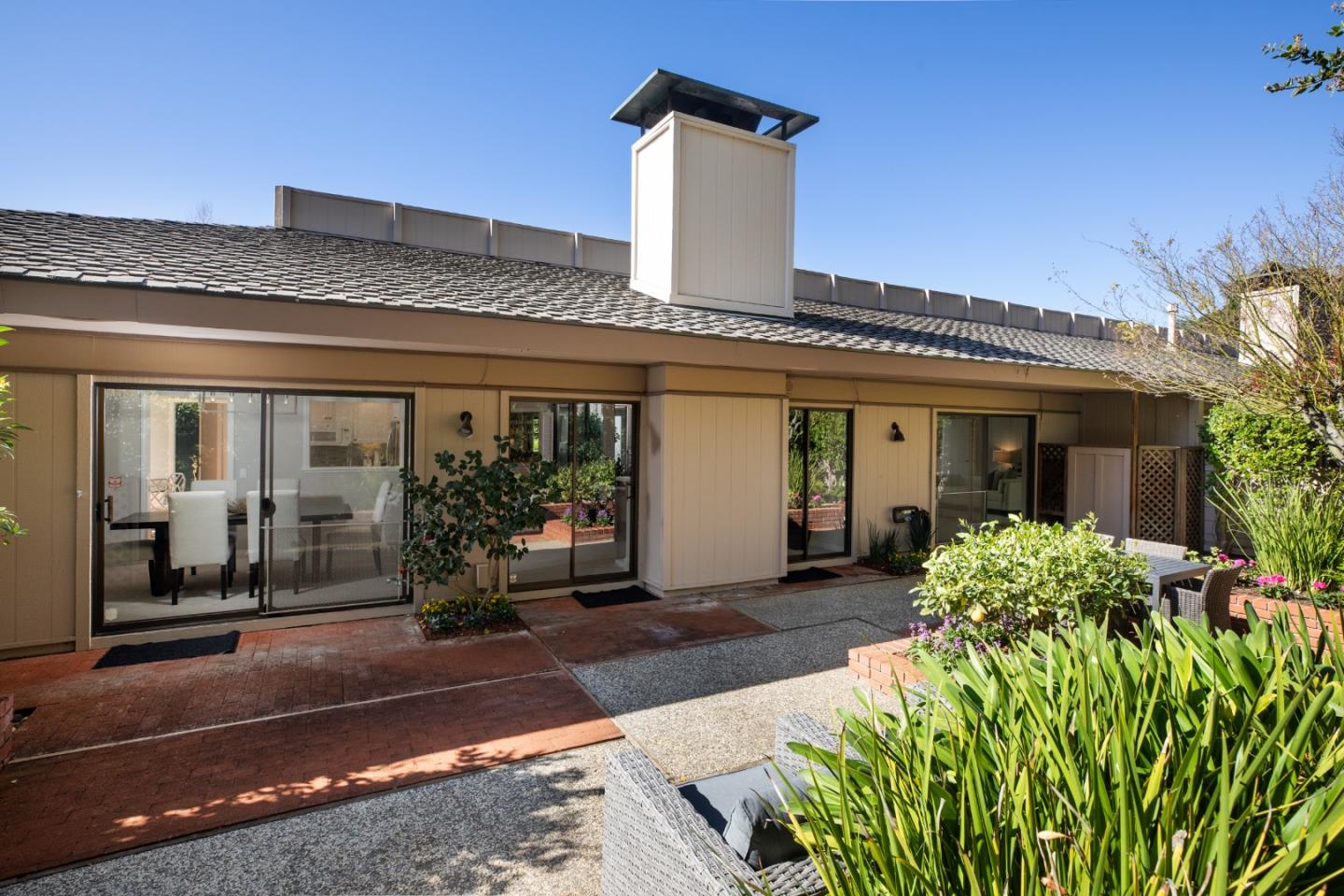 71 Bay Tree Lane Los Altos, CA 94022 - Photo 21 of 32 a front view of a house with garden