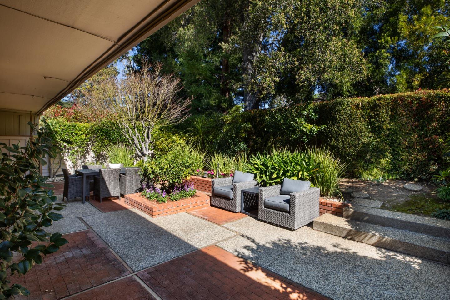 71 Bay Tree Lane Los Altos, CA 94022 - Photo 22 of 32 a view of a backyard with sitting area