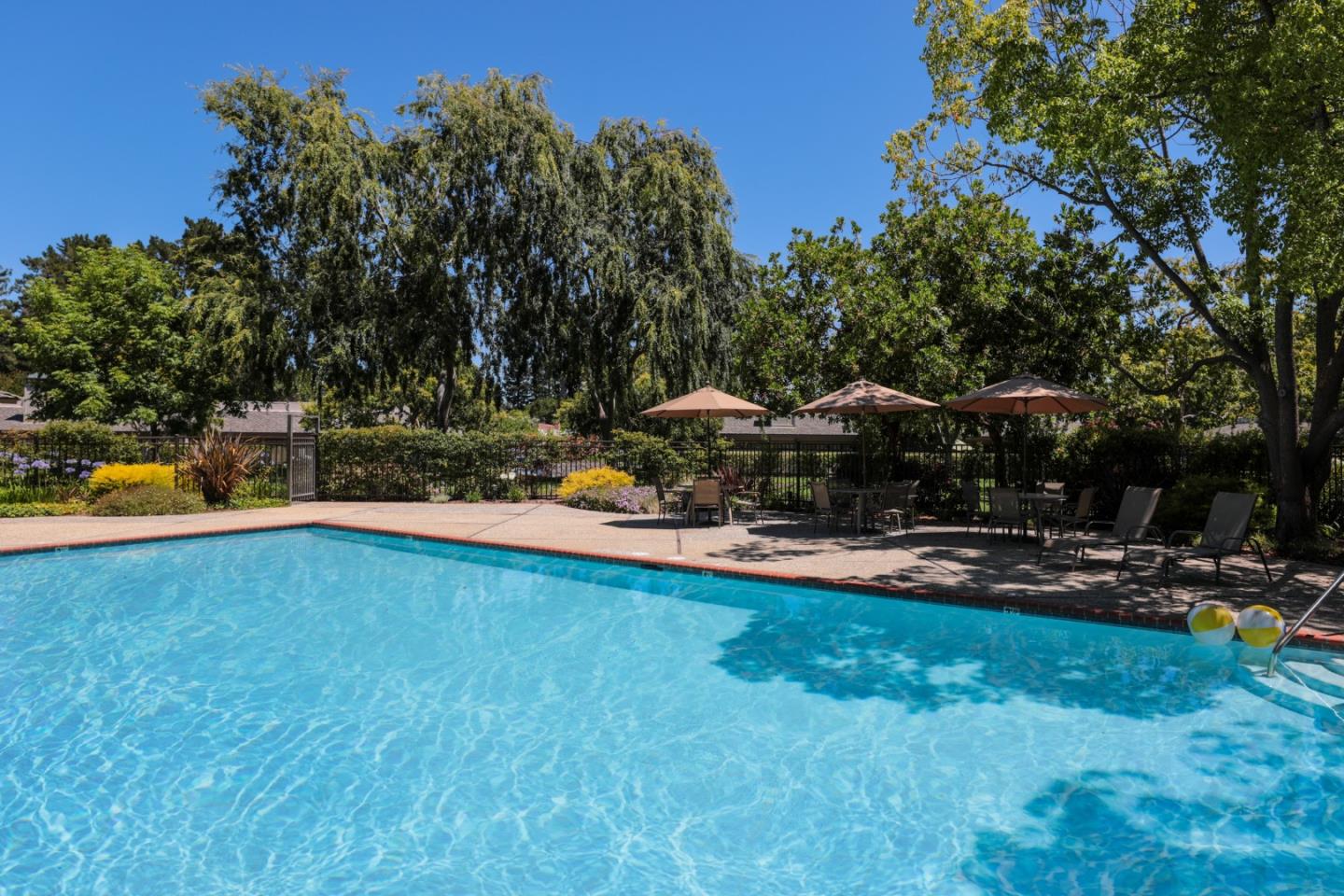 71 Bay Tree Lane Los Altos, CA 94022 - Photo 27 of 32 a view of a house with swimming pool and sitting area