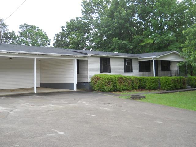 3381 Irish Road Chatham, VA 24531 - Photo 1 of 15 a view of a house with a yard and garage