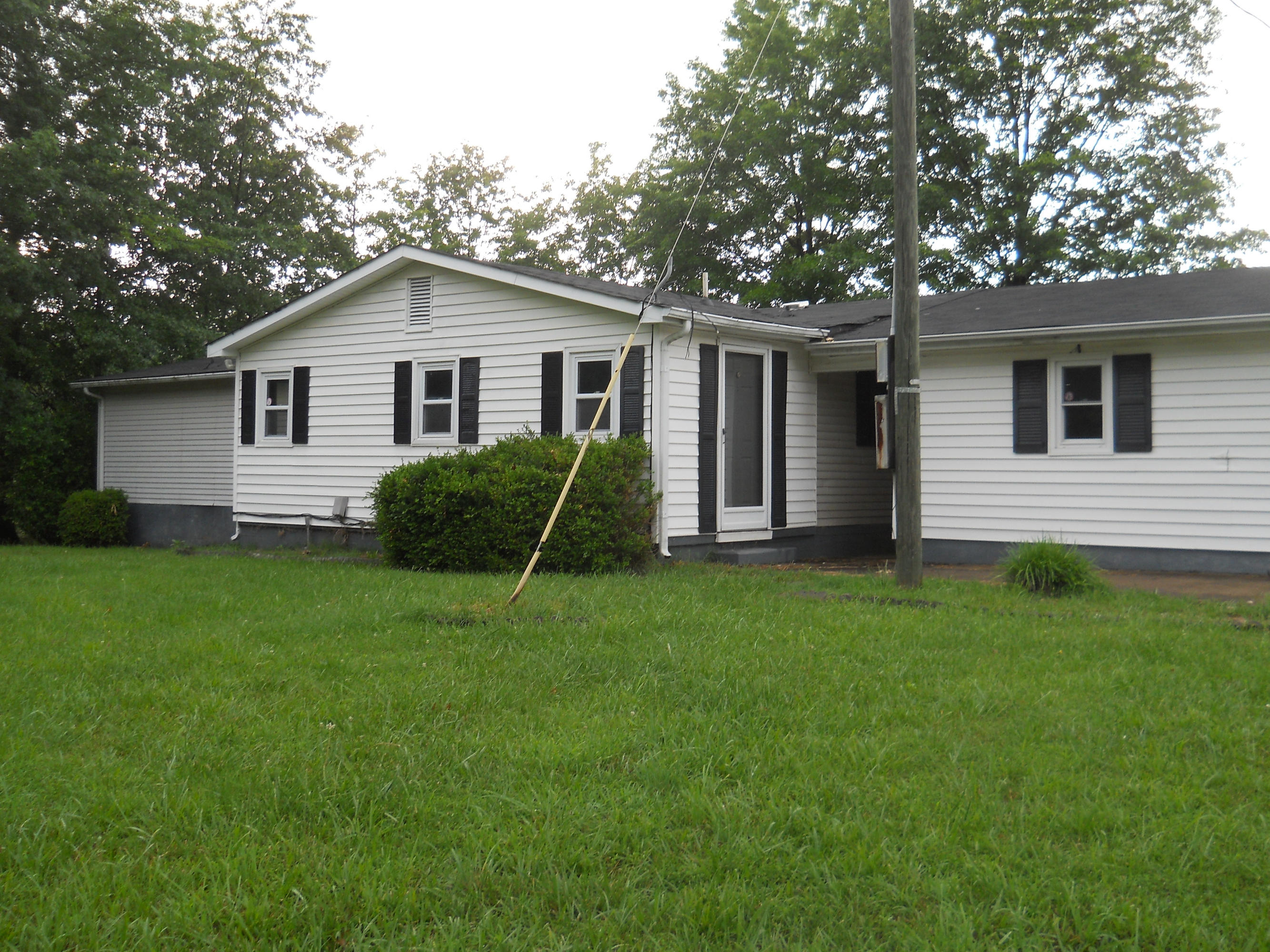 3381 Irish Road Chatham, VA 24531 - Photo 2 of 15 a view of a house with a yard and large tree