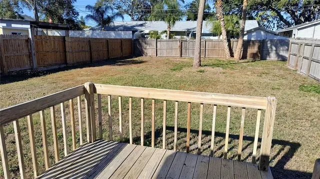 a view of a wooden fence