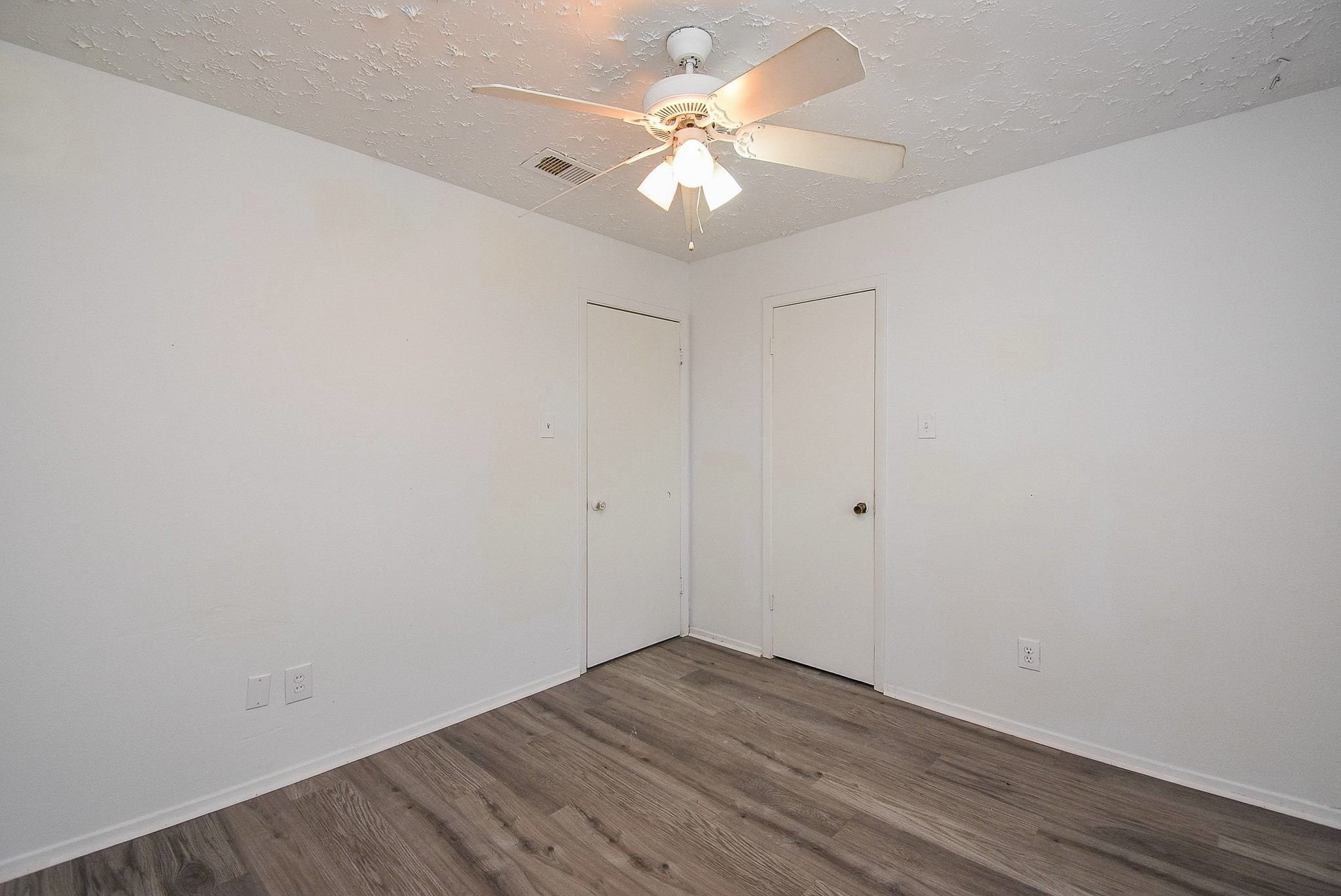 16330 Meadowbrook Farm Road Houston, TX 77082 - Photo 16 of 20 wooden floor in an empty room