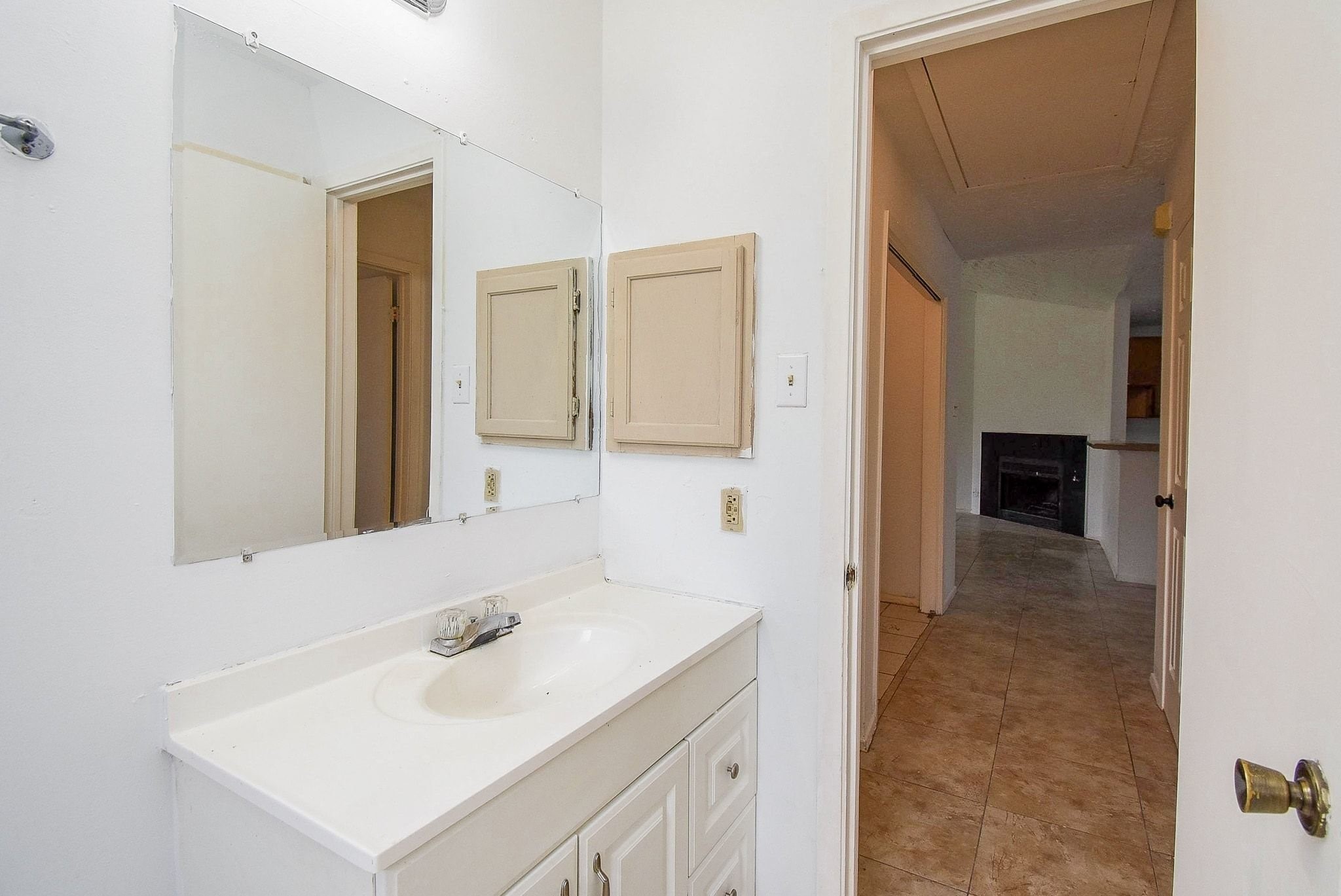 16330 Meadowbrook Farm Road Houston, TX 77082 - Photo 17 of 20 a bathroom with a sink and a mirror
