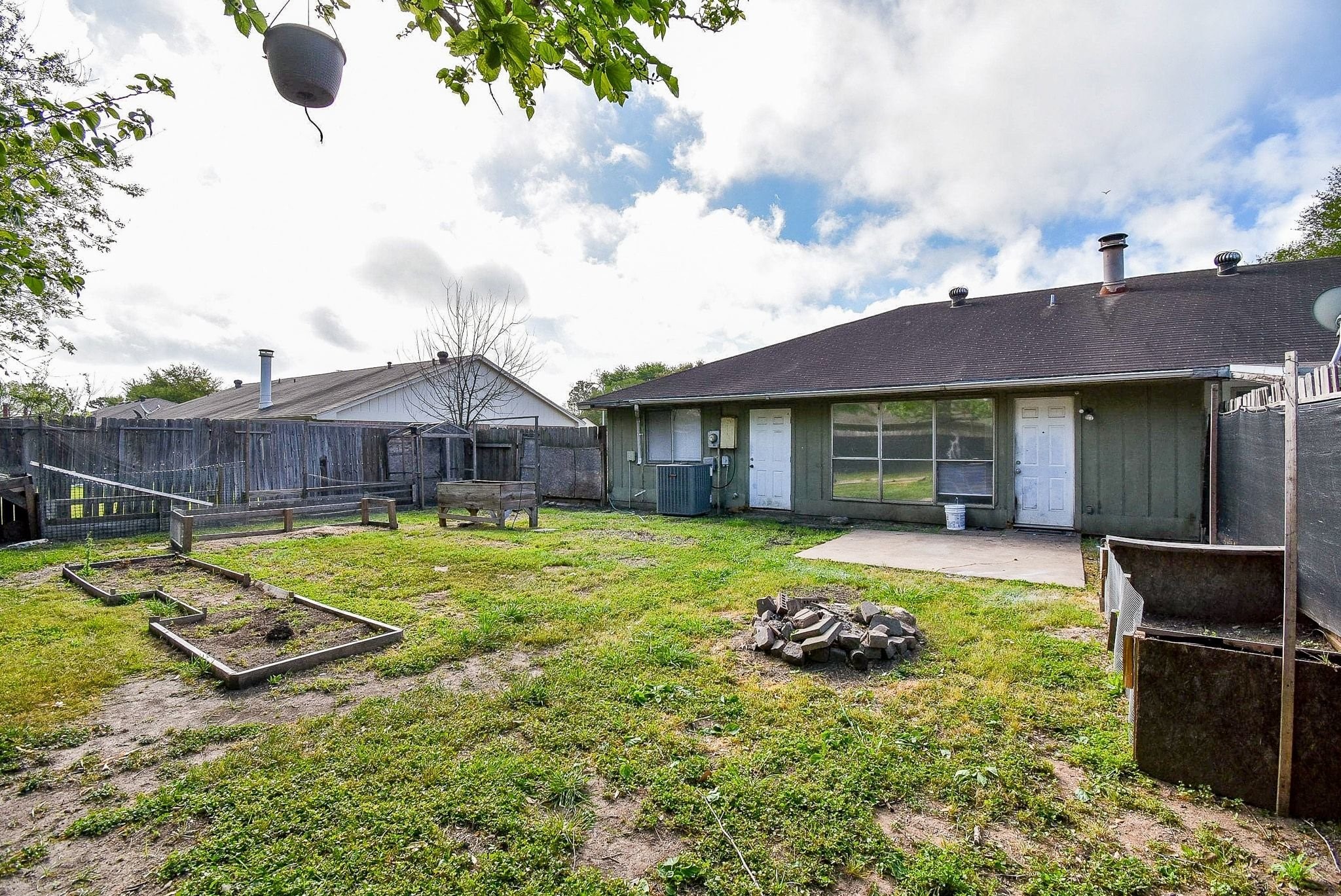 16330 Meadowbrook Farm Road Houston, TX 77082 - Photo 19 of 20 a view of a house with swimming pool and a yard