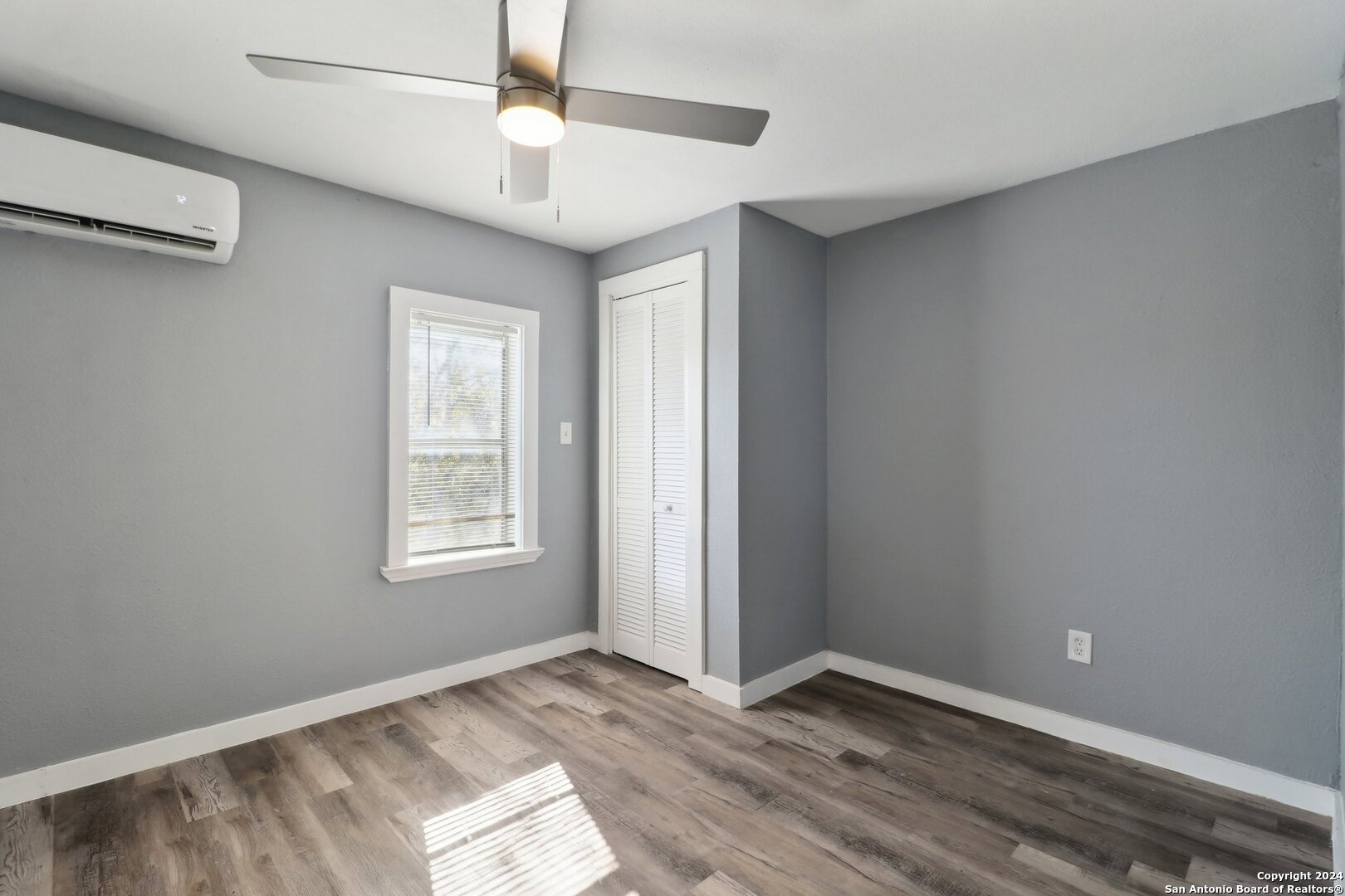 132 Renfro Drive Devine, TX 78016 - Photo 17 of 36 a view of an empty room with a window