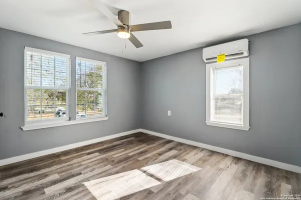 a view of an empty room and window