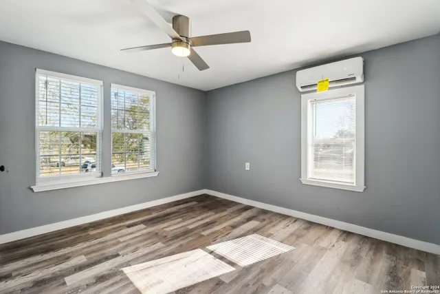 a view of an empty room and window