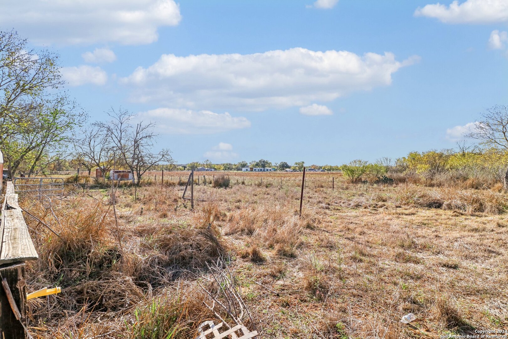 132 Renfro Drive Devine, TX 78016 - Photo 32 of 36 a view of yard covered with snow