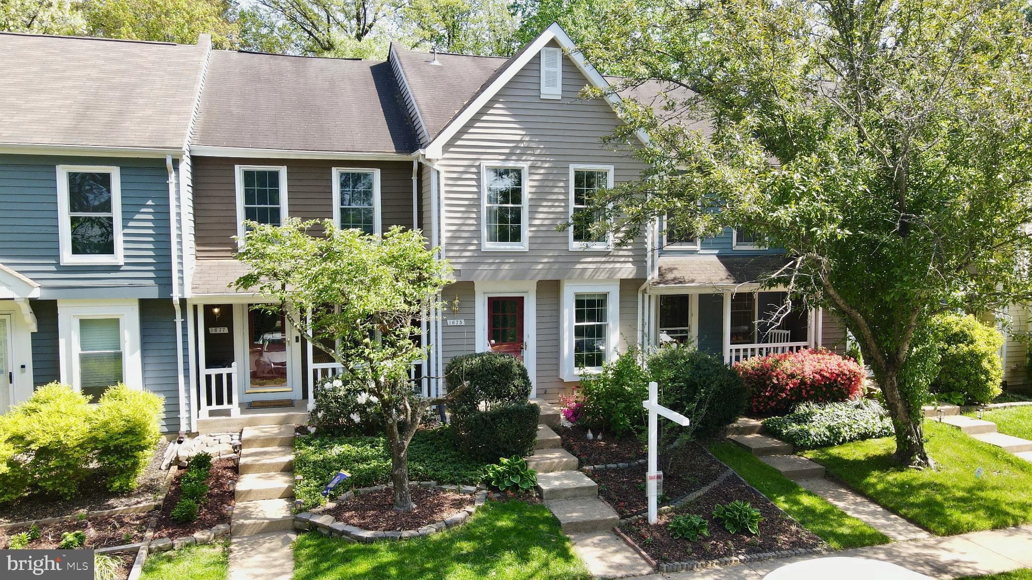 1675 Poplar Grove Drive Reston, VA 20194 - Photo 23 of 32 a front view of a house with garden