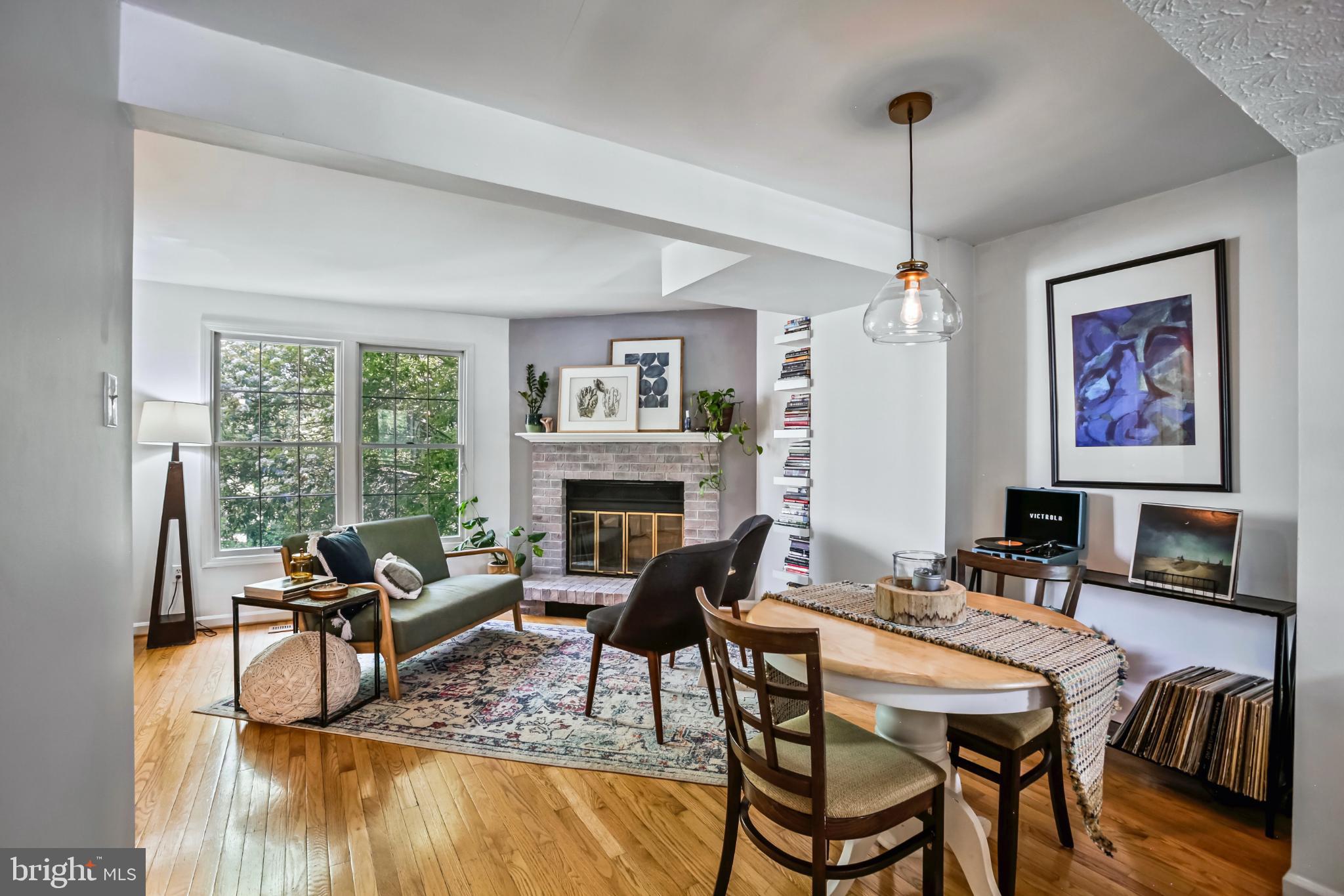1675 Poplar Grove Drive Reston, VA 20194 - Photo 6 of 32 a living room with furniture and a fireplace