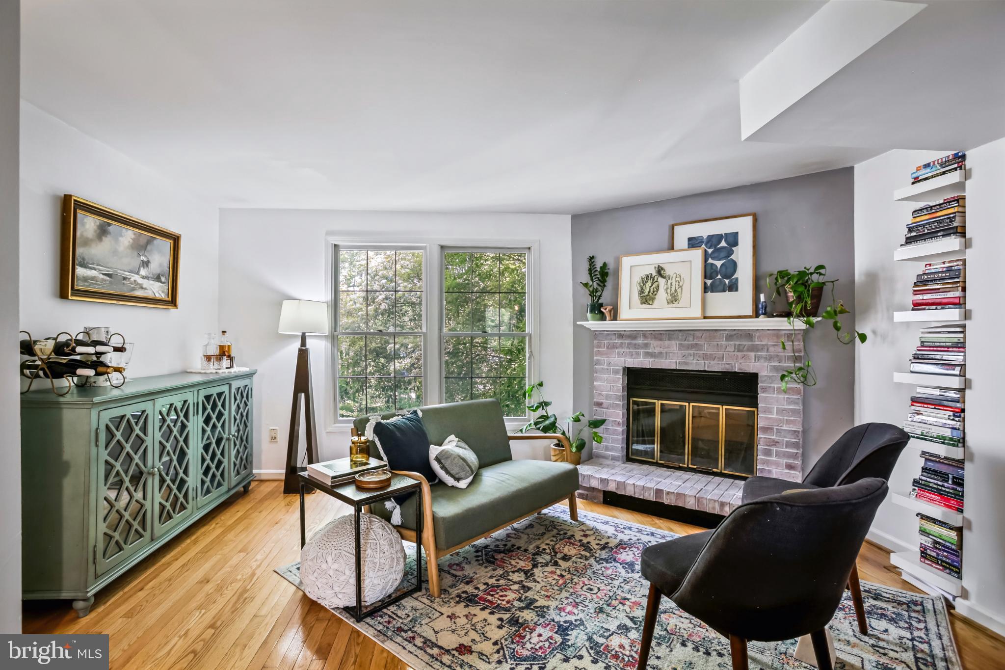 1675 Poplar Grove Drive Reston, VA 20194 - Photo 7 of 32 a living room with furniture and a fireplace