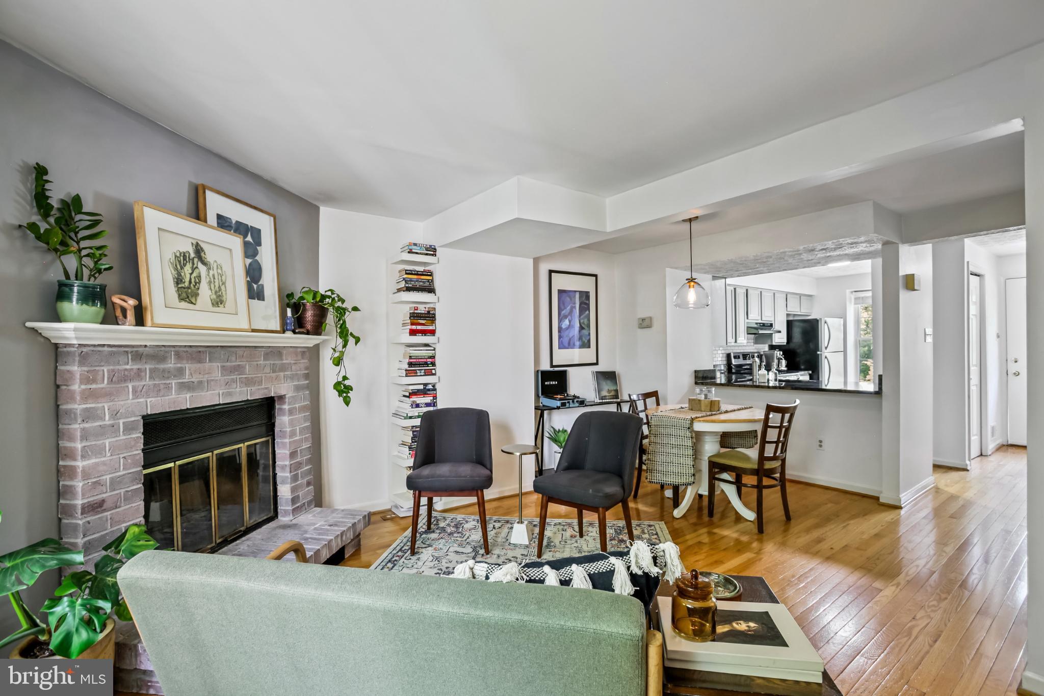 1675 Poplar Grove Drive Reston, VA 20194 - Photo 8 of 32 a living room with furniture and a fireplace