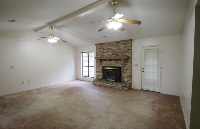 465 Ridge Lake Road Crestview, FL 32536 - Photo 12 of 34 an empty room with a fireplace and fan