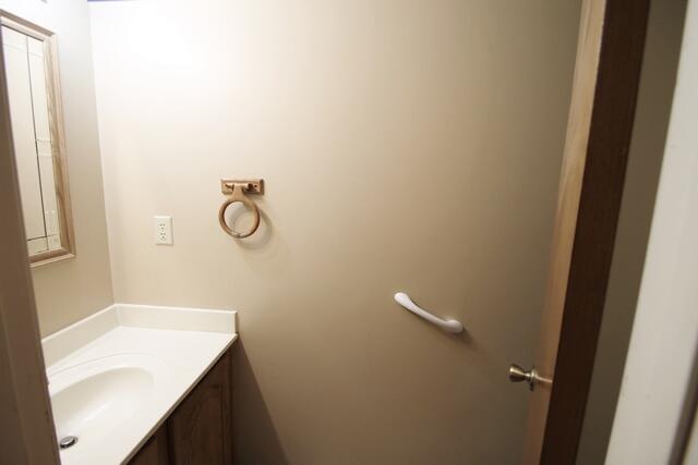 465 Ridge Lake Road Crestview, FL 32536 - Photo 21 of 34 a bathroom with a sink and a mirror