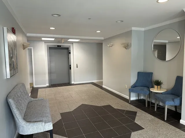 a view of a livingroom with furniture and furniture