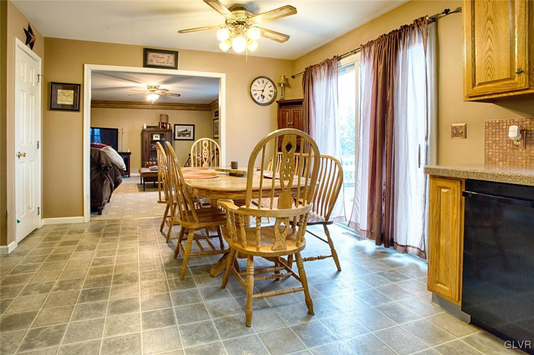 761 Lahr Road Nazareth, PA 18064 - Photo 4 of 30 a view of a dining room with furniture and a chandelier