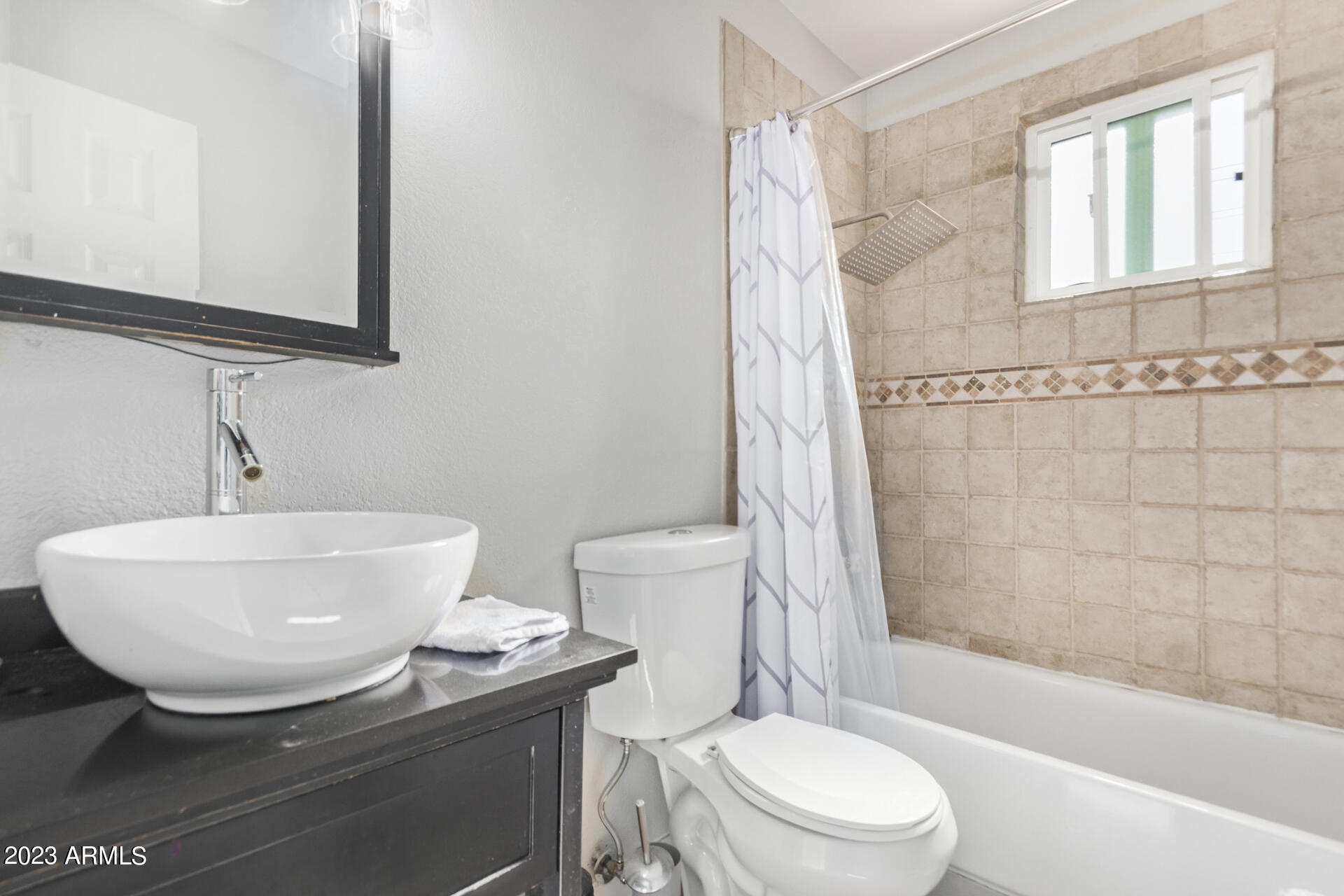 4401 North 12th Street, Unit 120 Phoenix, AZ 85014 - Photo 12 of 21 a bathroom with a sink toilet and shower