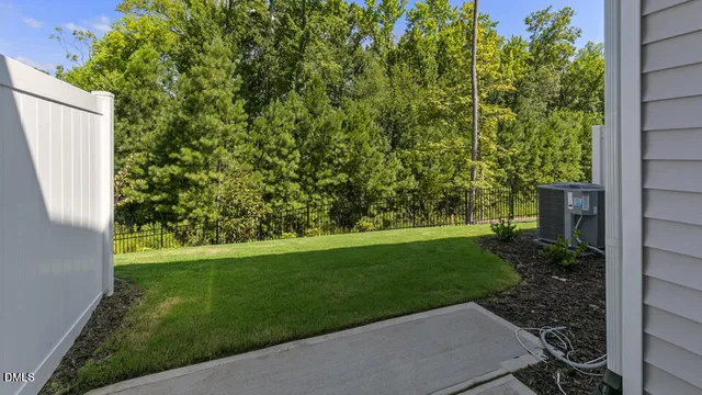 a view of a yard with plants