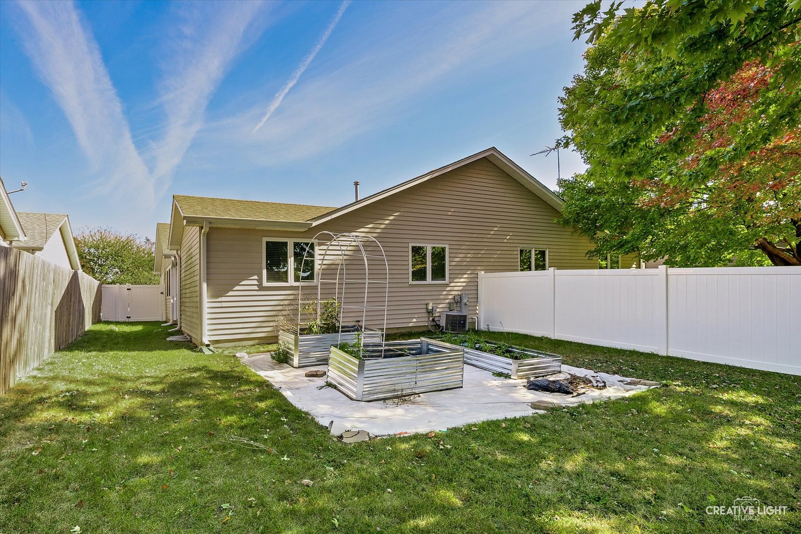48 Silver Trail North Aurora, IL 60542 - Photo 19 of 29 a backyard of a house with seating space