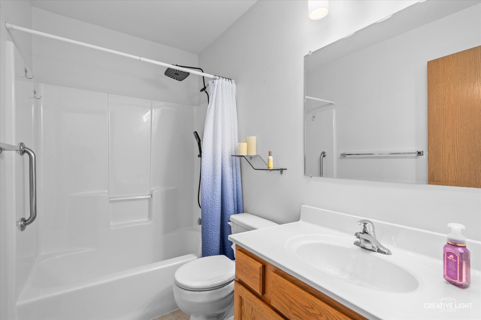48 Silver Trail North Aurora, IL 60542 - Photo 10 of 29 a bathroom with a sink toilet and shower