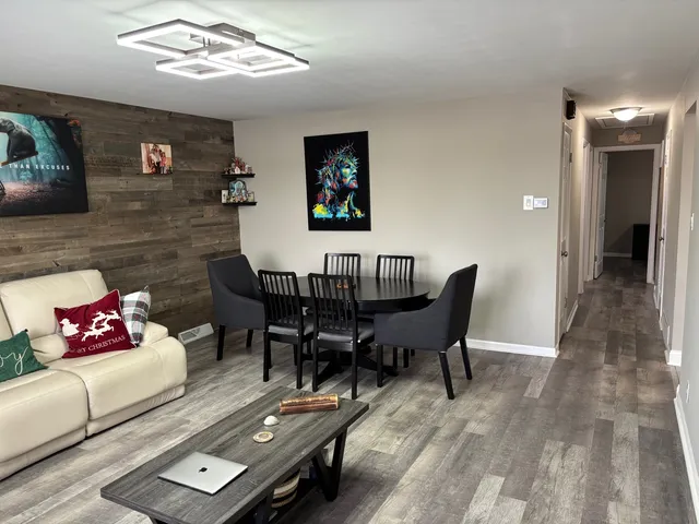 a workspace with furniture and window