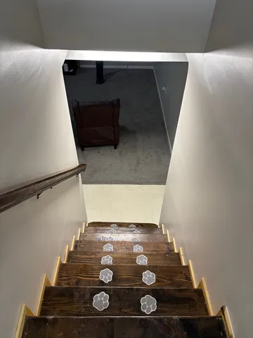 a room with a sink and a mirror