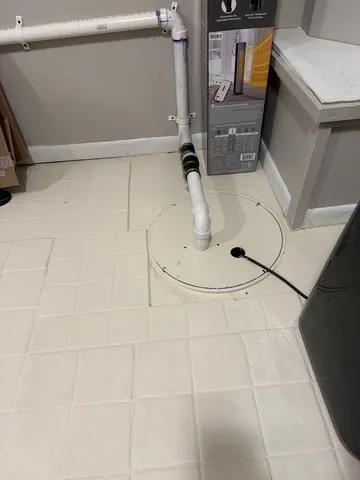 a view of backyard of house with seating space