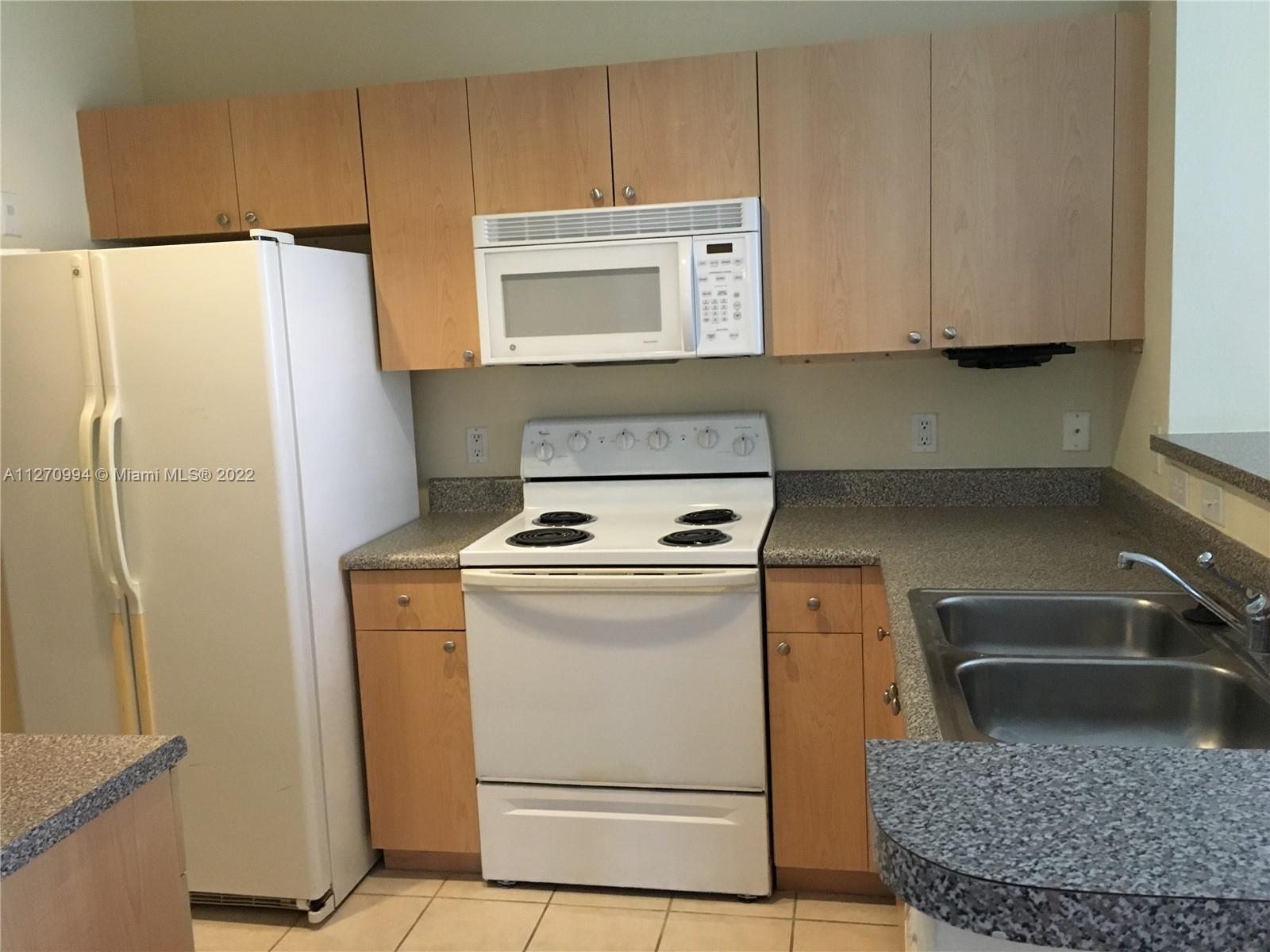 7910 North Nob Hill Road, Unit 107 Tamarac, FL 33321 - Photo 3 of 15 Gallery Image 3