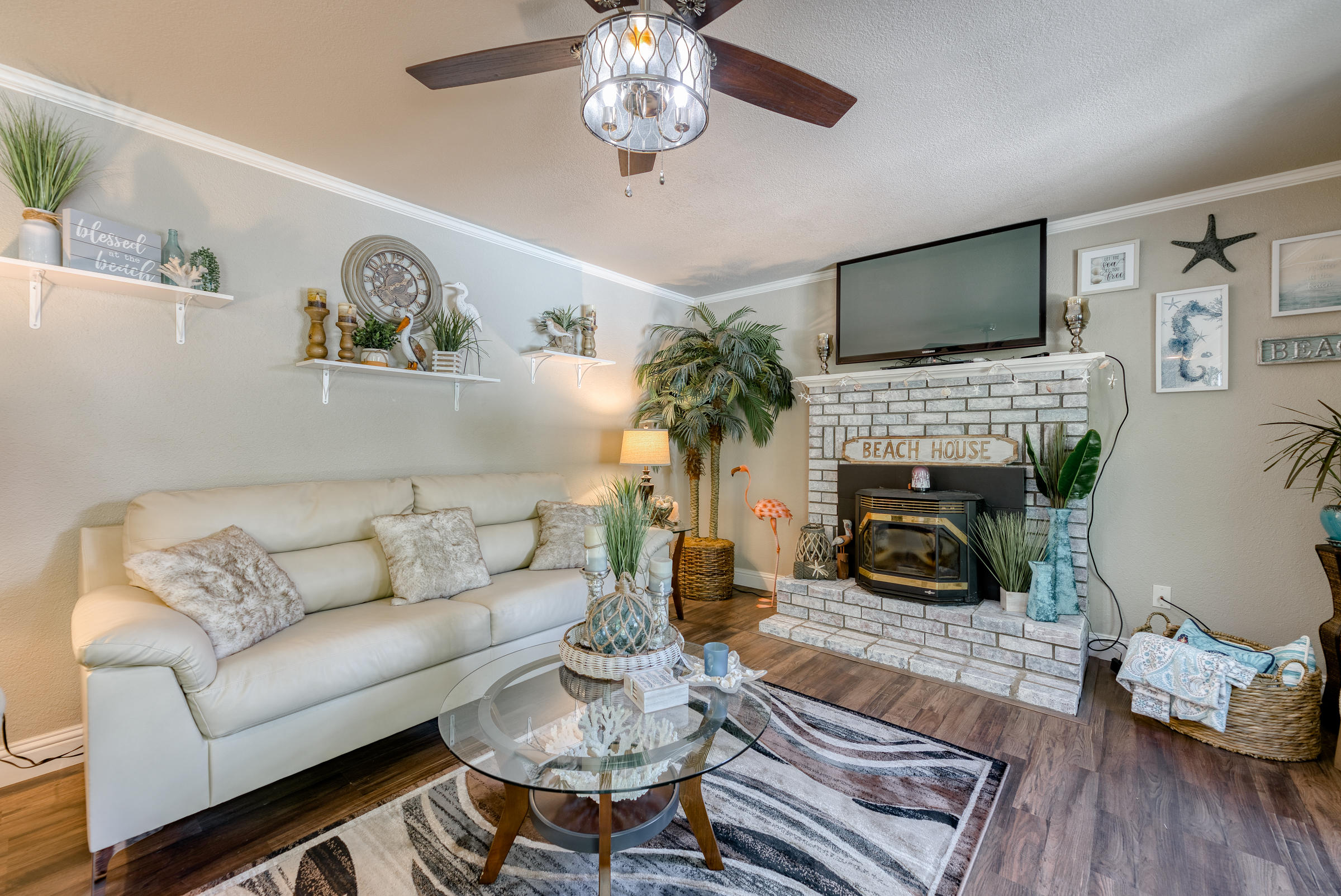 2016 Canyon Road Redding, CA 96001 - Photo 11 of 35 a living room with furniture a flat screen tv and a fireplace