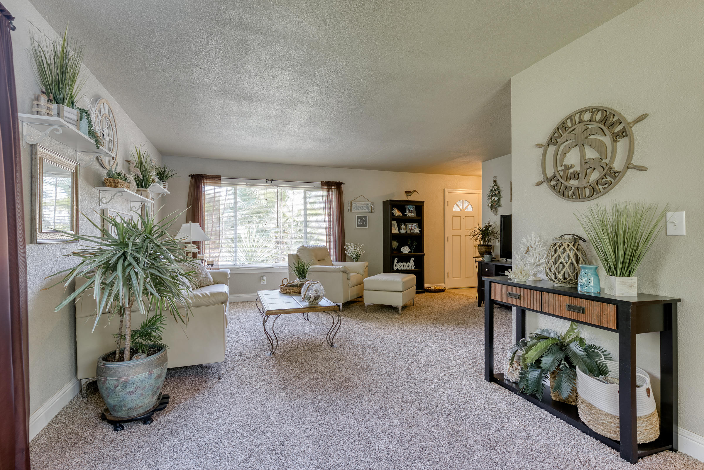 2016 Canyon Road Redding, CA 96001 - Photo 7 of 35 a living room with furniture and a potted plant