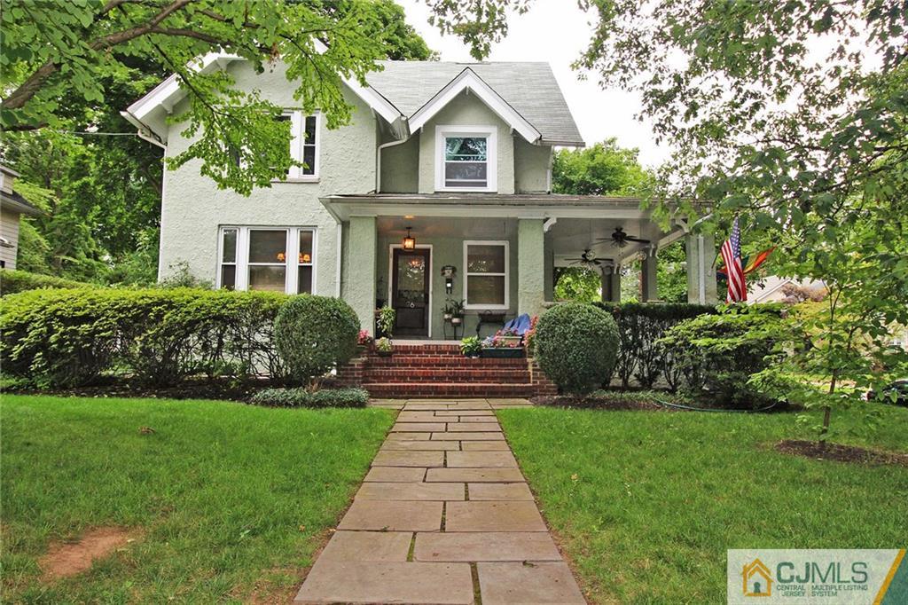 76 Rector Street Metuchen, NJ 08840 - Photo 1 of 25 a view of house and garden with large trees
