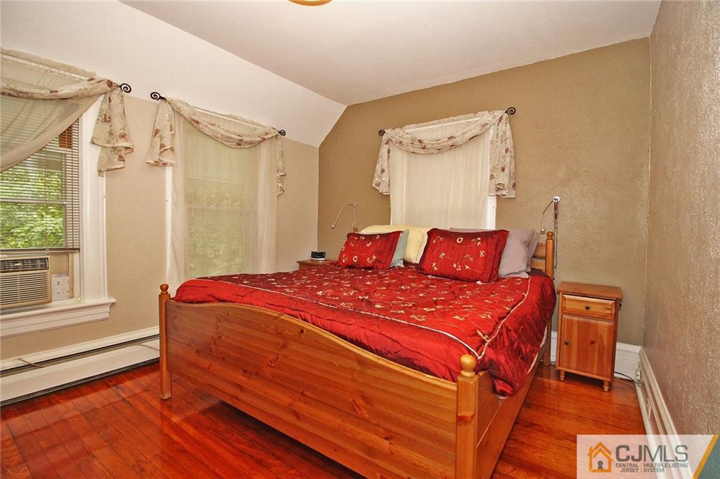 76 Rector Street Metuchen, NJ 08840 - Photo 13 of 25 a bedroom with a bed and a window