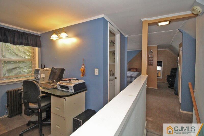 76 Rector Street Metuchen, NJ 08840 - Photo 16 of 25 a workspace with furniture and window