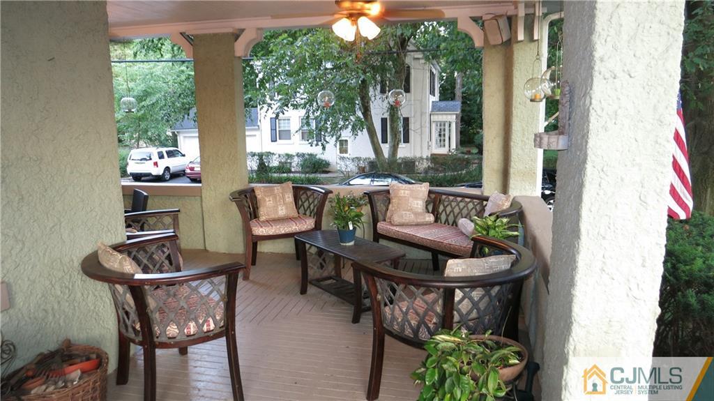 76 Rector Street Metuchen, NJ 08840 - Photo 3 of 25 a outdoor dining space with furniture and outdoor view