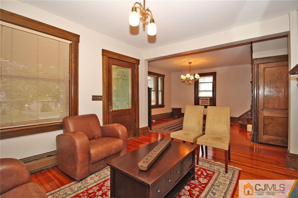 76 Rector Street Metuchen, NJ 08840 - Photo 10 of 25 a living room with furniture and a large window