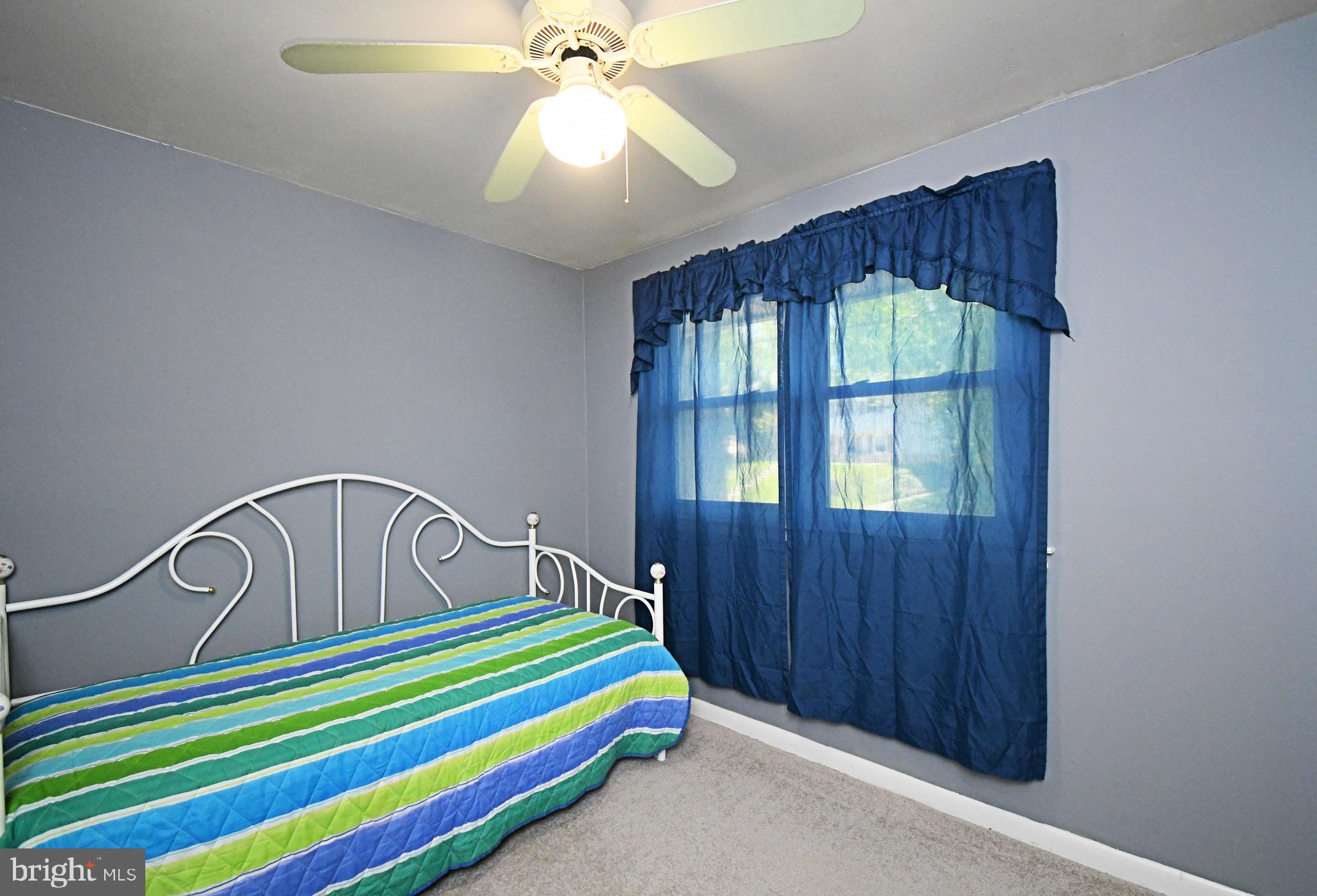 609 Mansfield Road Willow Grove, PA 19090 - Photo 26 of 68 a bedroom with a bed and a window