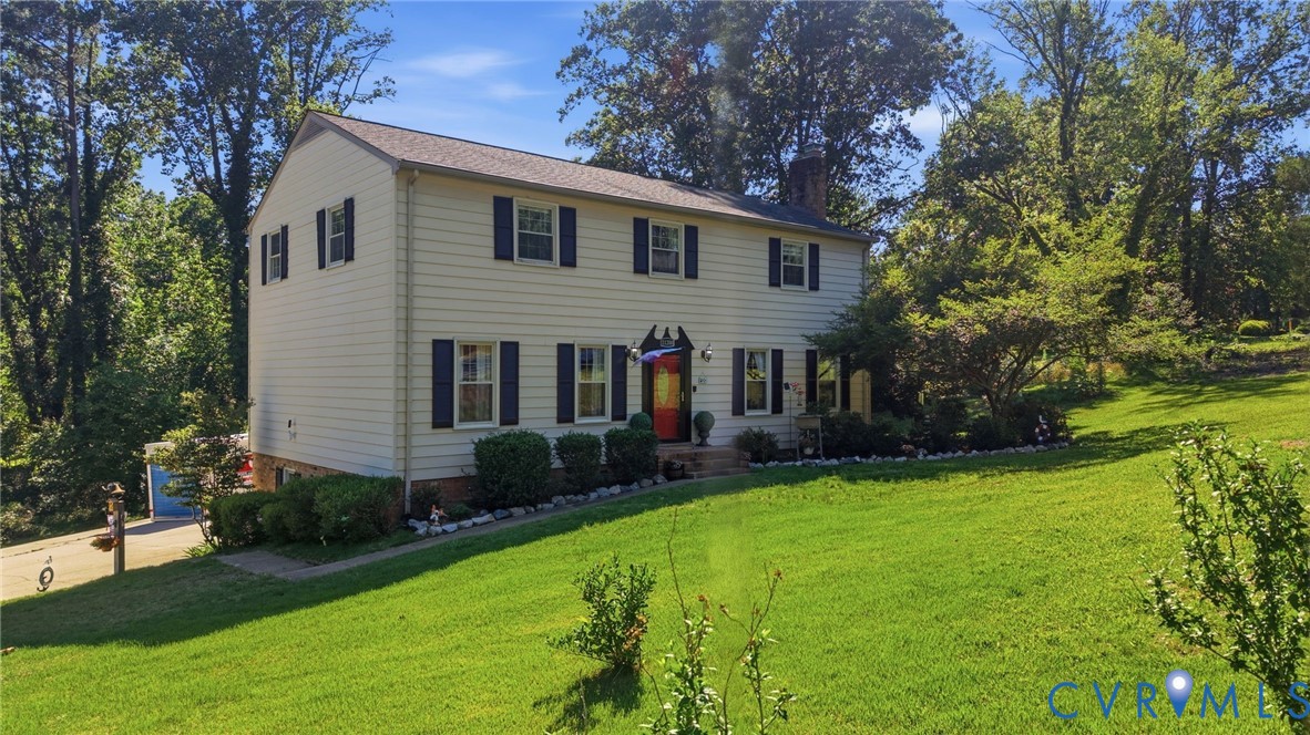 11200 Surry Road Chester, VA 23831 - Photo 45 of 48 a view of house with a yard and plants