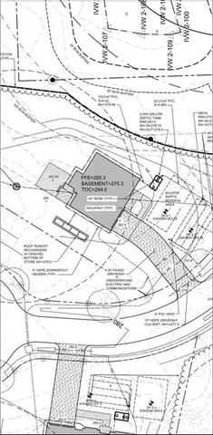 a black and white photo of a bench