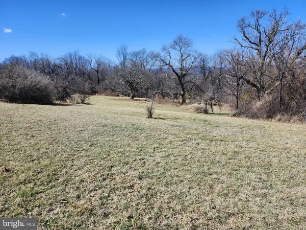 a view of an ocean and mountain