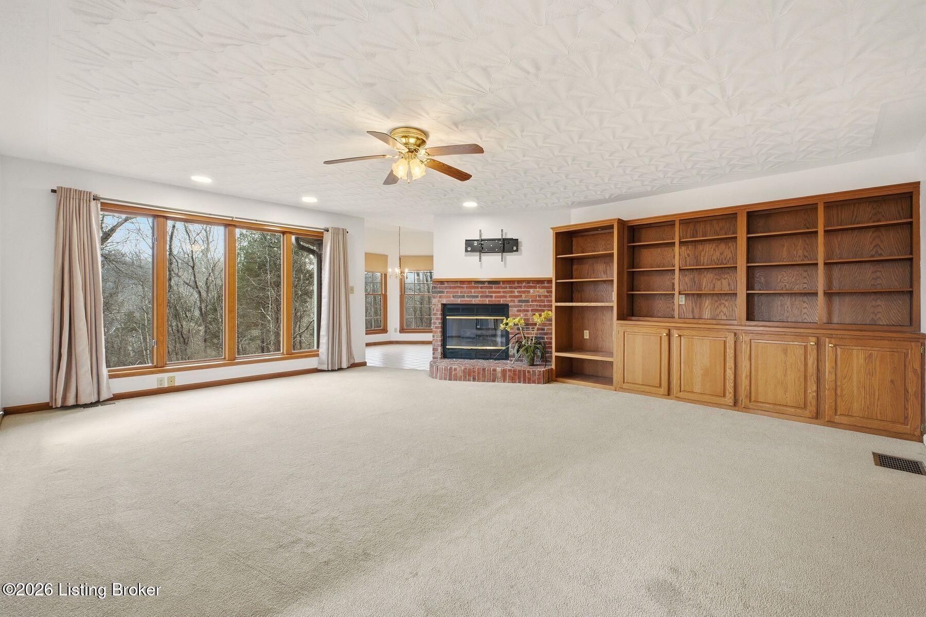 954 West Laurel River Road Shepherdsville, KY 40165 - Photo 14 of 44 Incredible Family Room with stunning views thru floor-to-ceiling windows