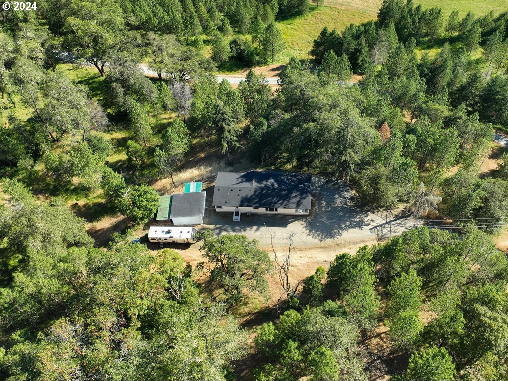 1069 Spring Brook Road Myrtle Creek, OR 97457 - Photo 33 of 43 an aerial view of residential house with outdoor space