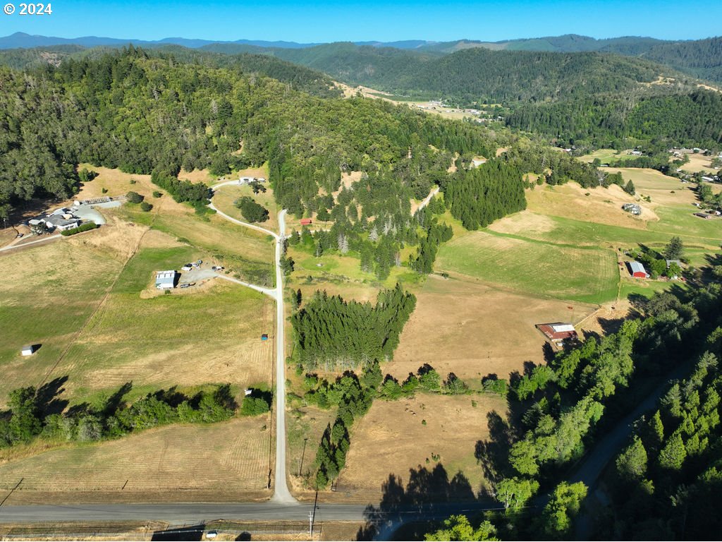 1069 Spring Brook Road Myrtle Creek, OR 97457 - Photo 41 of 43 a view of lake view and mountain view