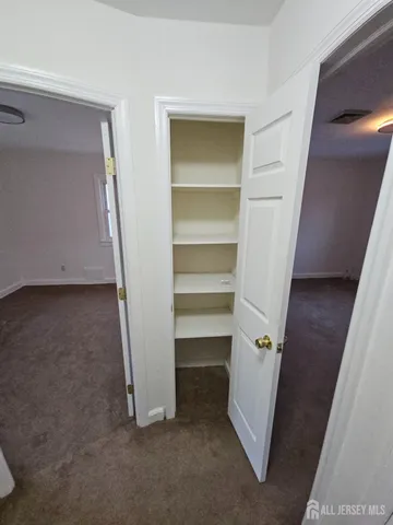 a bath room with a toilet and a bath tub