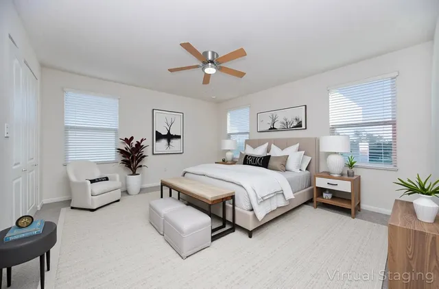 a bedroom with furniture and white walls