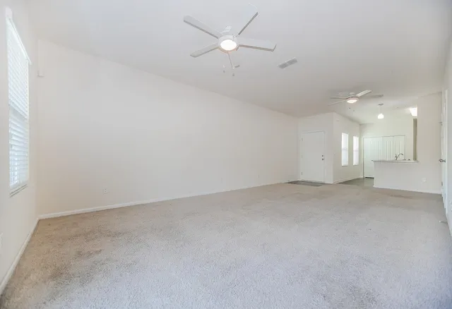 an empty room with a bathroom